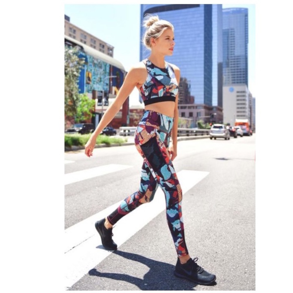These bold leggings are multicolor and mesh Pocket